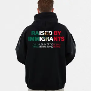Raised by Immigrants Graphic Shirt, Abolish I.C.E. Equality Theme T-Shirt/Sweatshirt/Hoodie, Empowerment Message Apparel for Men Women, Soft Casual Unisex Streetwear Top for Everyday Wear and Awareness Gift Idea classic  rock  tee moon  rocks macco