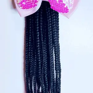 Braided ponytail with Beads and Bow Daily.