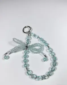 Luxury Pearl Bow Mobile Phone Chain High-End Crystal Lanyard Short Three-Dimensional Beaded Accessory for Elegant Ladies