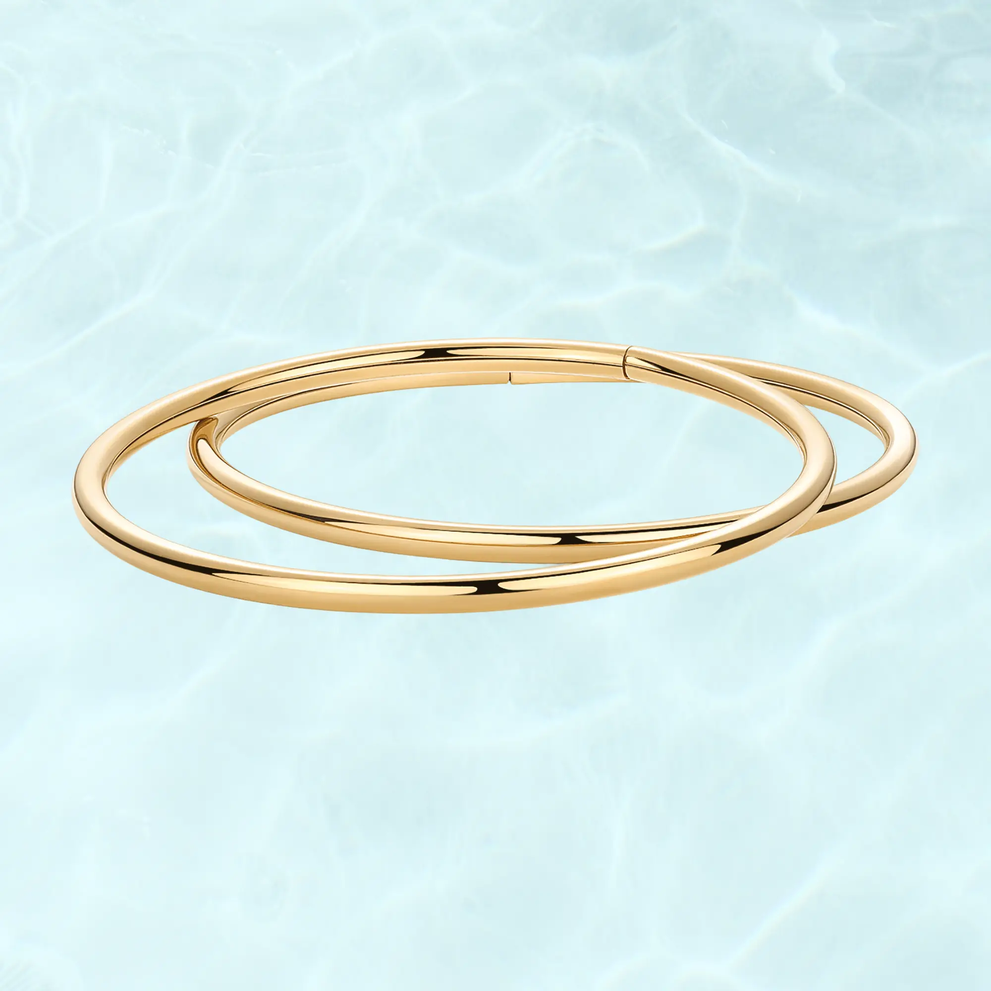 PAVOI Waterproof Bangle Bracelet for Women - 14K Gold Plated Classic Lightweight Stacking Stainless Steel Bracelet - 1-Piece & 2-Piece Bangles