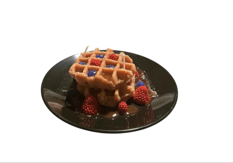 Belgian Waffles with Fresh Berries and Blueberries Topped with Syrup.