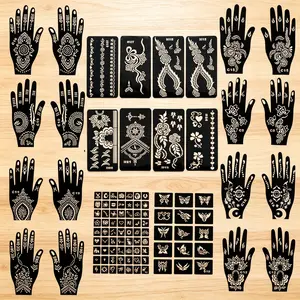 Portable hollow tattoo stencil set with hand-drawn designs. Waterproof and sweat-proof. Convenient to use for unisex personalized tattoo styles