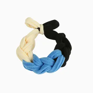 Unius Colorful Hair Tie - 1 piece. Soft knit multi-colored hair accessory to create a stylish look.