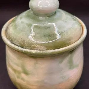 Small ceramic jar with lid