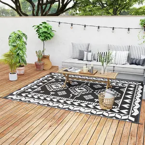 8' x 10' Reversible Outdoor Rug – Black & White Rhombus Patchwork Pattern. Double-Sided – 2 Color Schemes. Waterproof Plastic Straw. Includes Carry Bag. Perfect for RV, Camping or Patio