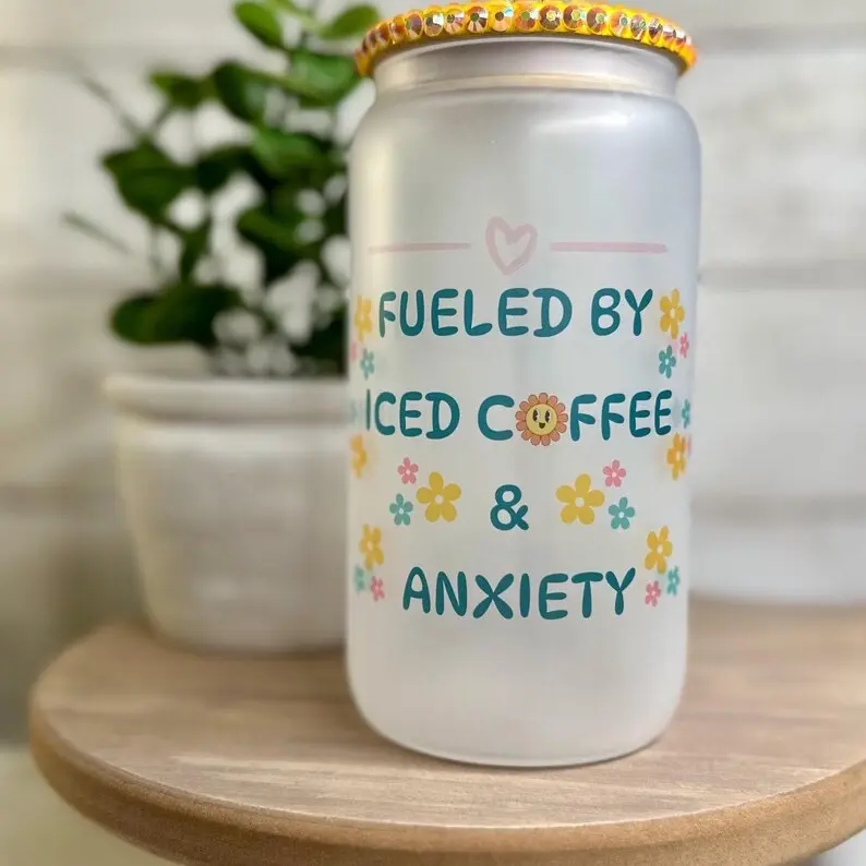 Fueled by Iced Coffee & Anxiety Frosted Can Mug with Rhinestone Lid and Colorful Floral Design