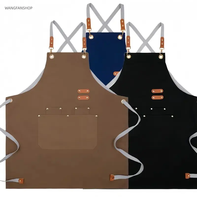 Single waterproof canvas cross-back work apron with multiple pockets and adjustable leather shoulder straps; oil-resistant and wear-resistant unisex apron suitable for kitchens, coffee shops, gardening, and home cleaning.