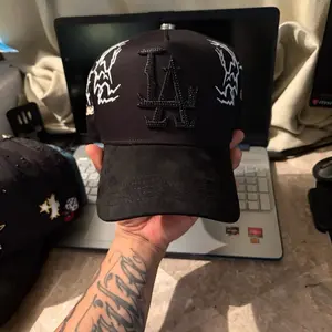 Don Hats - Black Baseball Cap with White Embroidered Design and Adjustable Strap for Men