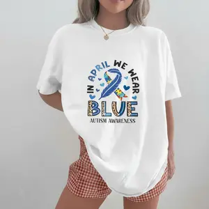 In April We Wear Blue Autism Awareness Ribbon And Puzzle Piece Print T Shirt Casual Round Neck Short Sleeve For Women Autism Awareness Month