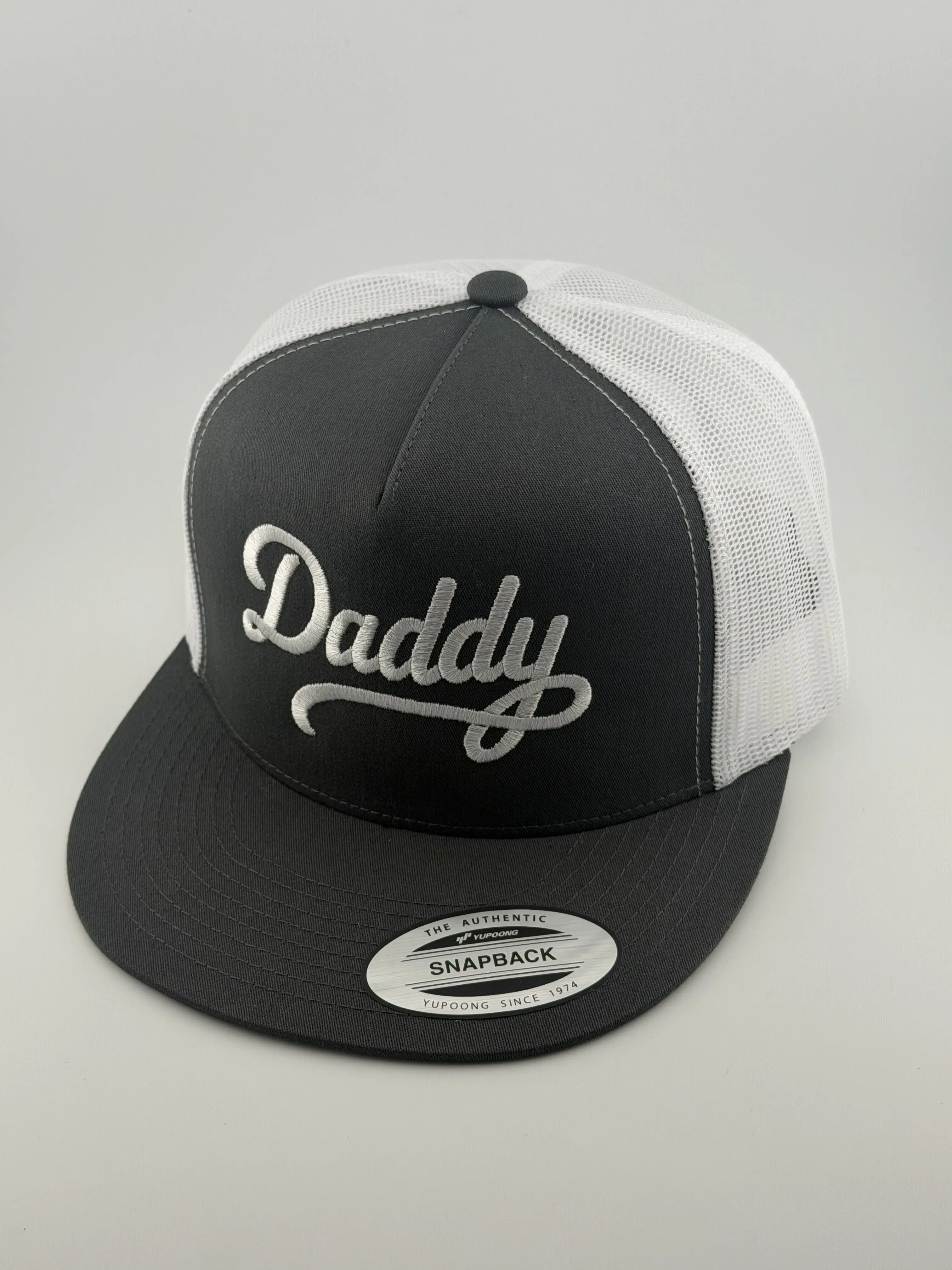 Yupoong Unisex Daddy Snapback Trucker Hat - Black Fabric, Bold White Script Embroidery, Breathable Sides, Flat Brim, Dadcore, Fatherhood Graphic, Adjustable Size, Self-Adjusting, 1 Size, Graphic Pattern, Premium Fitted Fashion Accessory, Adjustable Size H