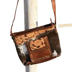 Sally-women’s Crossbody purse featuring front pocket and gorgeous studded design – genuine leather – real hair on hide