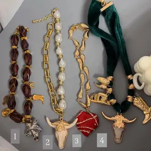 Collars Vaqueros - 4-Piece Set with Gold Chain, Pearl Beads, and Unique Charms for Stylish Accessory Collection