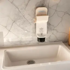 Aesthetic Wall Mounted Toothpaste Squeezer for Bathroom.Effortless Toothpaste & Lotion Squeezer, Kids Friendly.The rollerball toothpaste dispenser is a multi-functional tube dispenser suitable for various products such as toothpaste, cosmetics