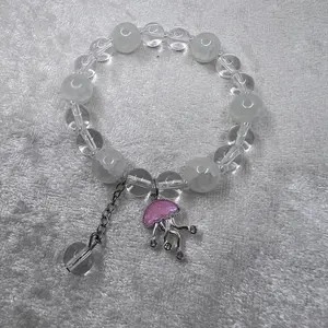 Glass Bead Bracelet with Silver Charm Featuring Pink Jellyfish Design and Clear Beads for Stylish Accessory