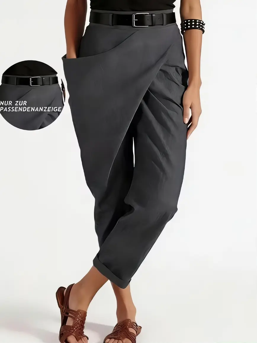 Fashionable, personalized, stylish, designed women's long pants with a solid color, a single pocket, no belt, woven in a satin fabric, and featuring a slim fit and a tapered leg design.