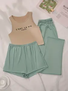 Women's summer pajama three-piece set. Beige camisole matched with light green shorts and long pants. Made of cool and breathable fabric, featuring lazy casual fashion style, ideal for home leisure in hot summer.