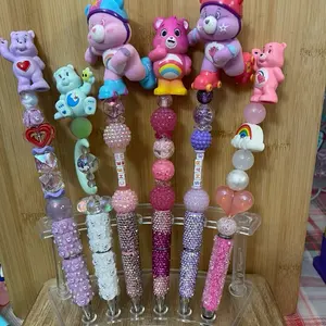 bear beaded pens with colorful beads and fun designs.