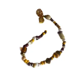 Divine Essence- Divine Threads Loc Jewelry with Colorful Beads and Unique Design Elements