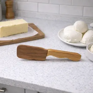 Walnut and hickory butter and soft cheese spreader