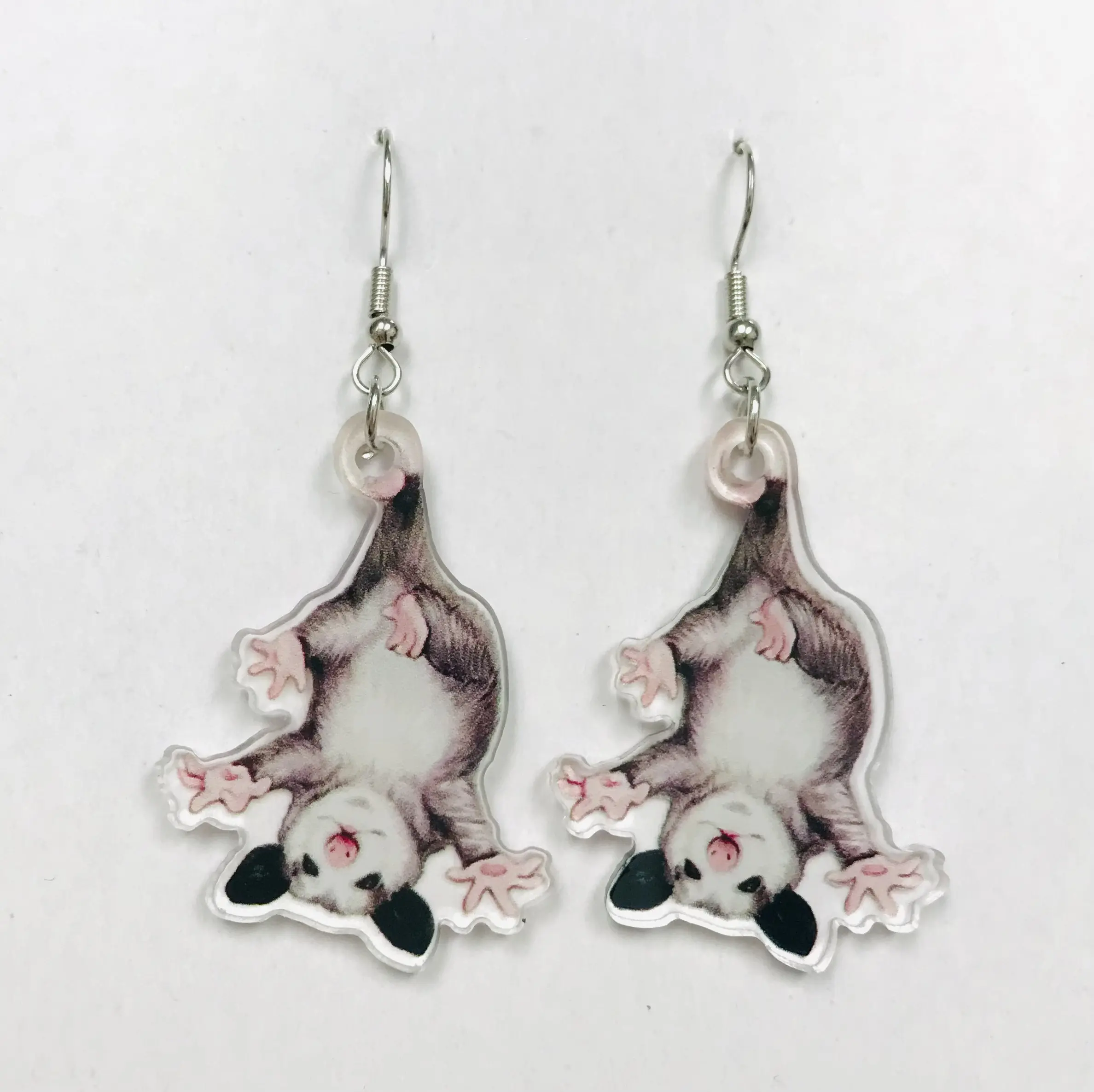 cute opossum earrings