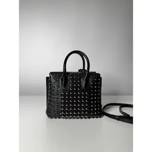 Pre-owned pebbled leather Crossbody Bags MCM Mini Milla Black Studded Crossbody Bag
