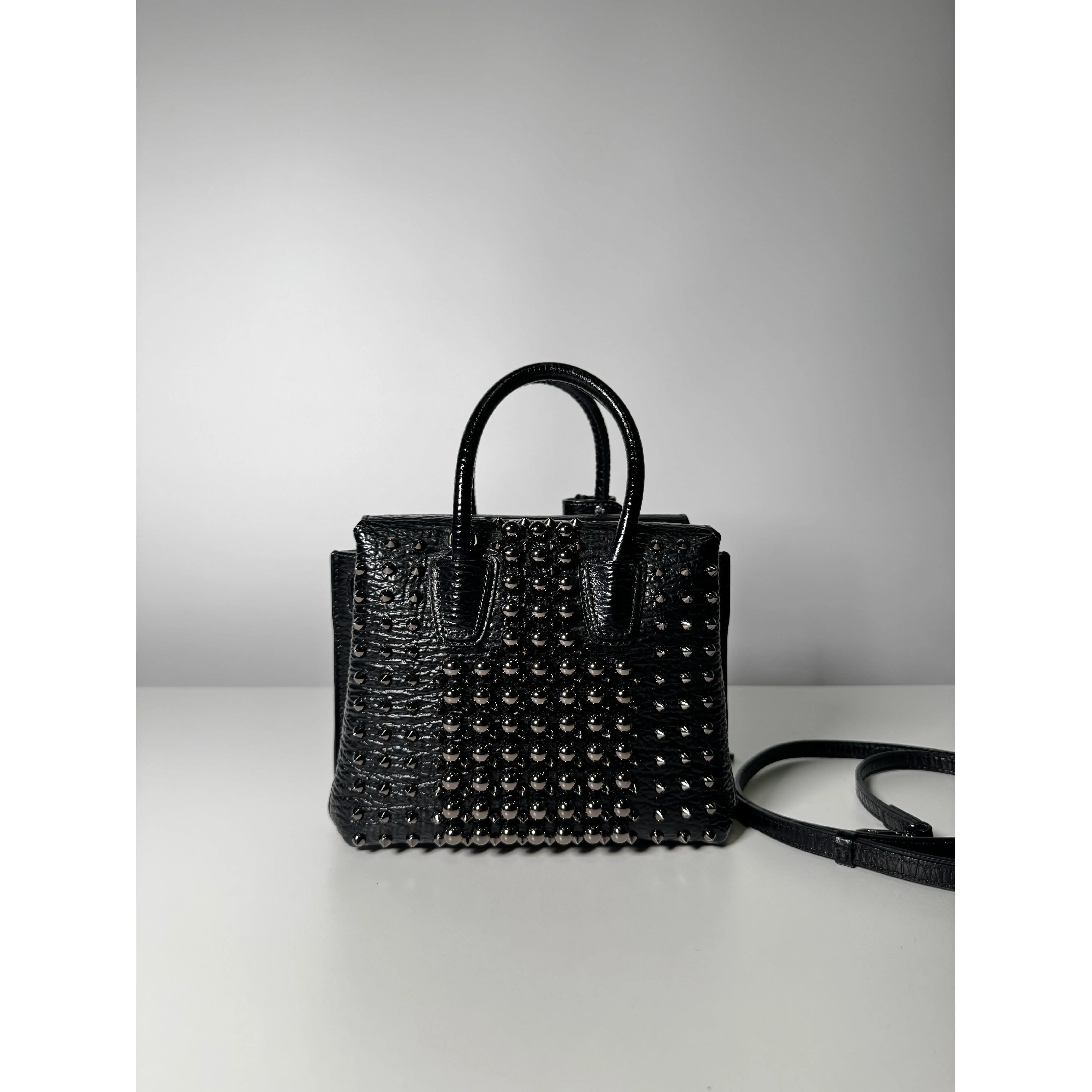 Pre-owned pebbled leather Crossbody Bags MCM Mini Milla Black Studded Crossbody Bag