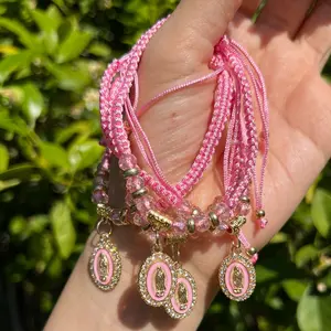 Pink And Gold Virgencita Thread Bracelet