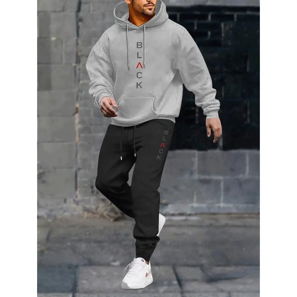 Light gray clothes and black pants