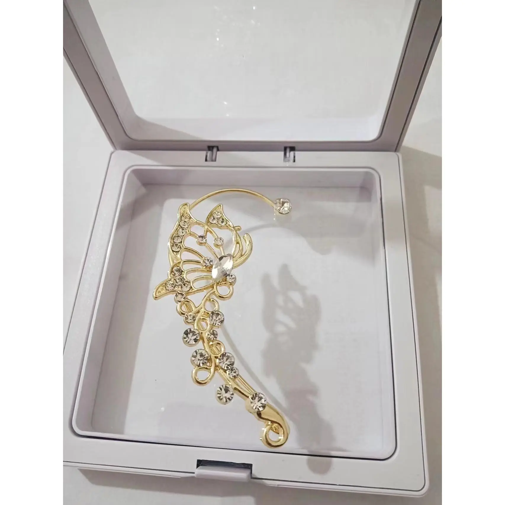 Zircon butterfly golden right ear