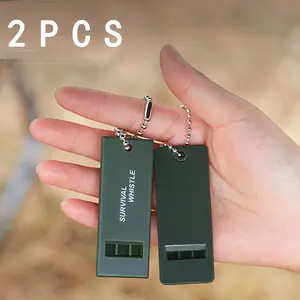 Two three-frequency outdoor sports survival whistle first aid whistle students practice whistle referee whistle travel mountaineering survival whistle treble high frequency earthquake relief whistle.