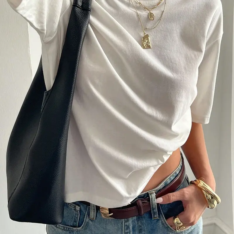 Women's solid black Top Basic Summer Short Baggy Loose Fit Y2K streetwear Trend style Everyday Tops, suitable for casual streetwear, parties, and everyday wear.