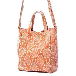 copacabana bag | orange snake-embossed leather