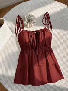 Women's Tie Strap Camisole Top.With A-Line Hem.Features French Gentle Style, Sweet & Alluring Style, Vacation Casual Style, Japanese Doll Style.Ideal for vacations, daily outings, afternoon tea, dates, music festivals, gatherings and other occasions
