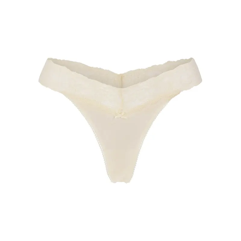 SKIMS LIGHTWEIGHT COTTON WIDE LACE THONG