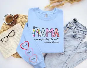 Custom This Mama Wears Her Heart On Her Sleeve Sweater, Personalized Mom With Kids Names Apparel, Motherhood Gifts, Mother's Day Gift