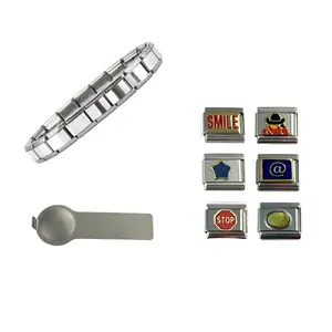 Italian Charm Bracelet Set comes with 18 link Shiny finish Starter Bracelet, Tool, The Tool May be either of the 2 styles I sell, and 6 charms including Smile, Blue Star, Cowboy, @, Stop Sign, and an Oval Stone color varies.  9mm You Put Together