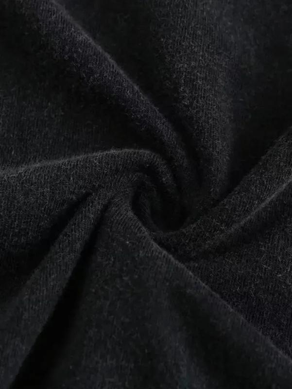 The T-shirt features a hand print, a cross necklace and the words 'Tupac' as a tribute to the legendary rapper