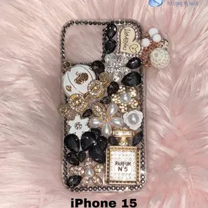 Bling iPhone Case for iPhone 15 with Luxurious Rhinestones and Elegant Perfume Bottle Design