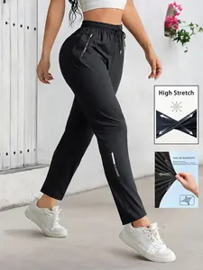 Women’s athletic casual nine-tenths pants featuring a drawstring waist and zippered pockets; solid color, versatile and stylish—ideal for everyday wear, gym workouts, yoga studios, outdoor jogging.