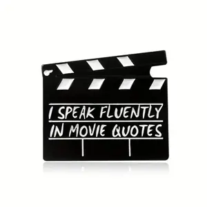 “I speak fluently in movie quotes” enamel pin