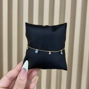 Pulsera con colgantes de ojos azules y piedras brillantes en plata 925