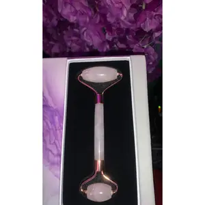 Rose quartz facial roller