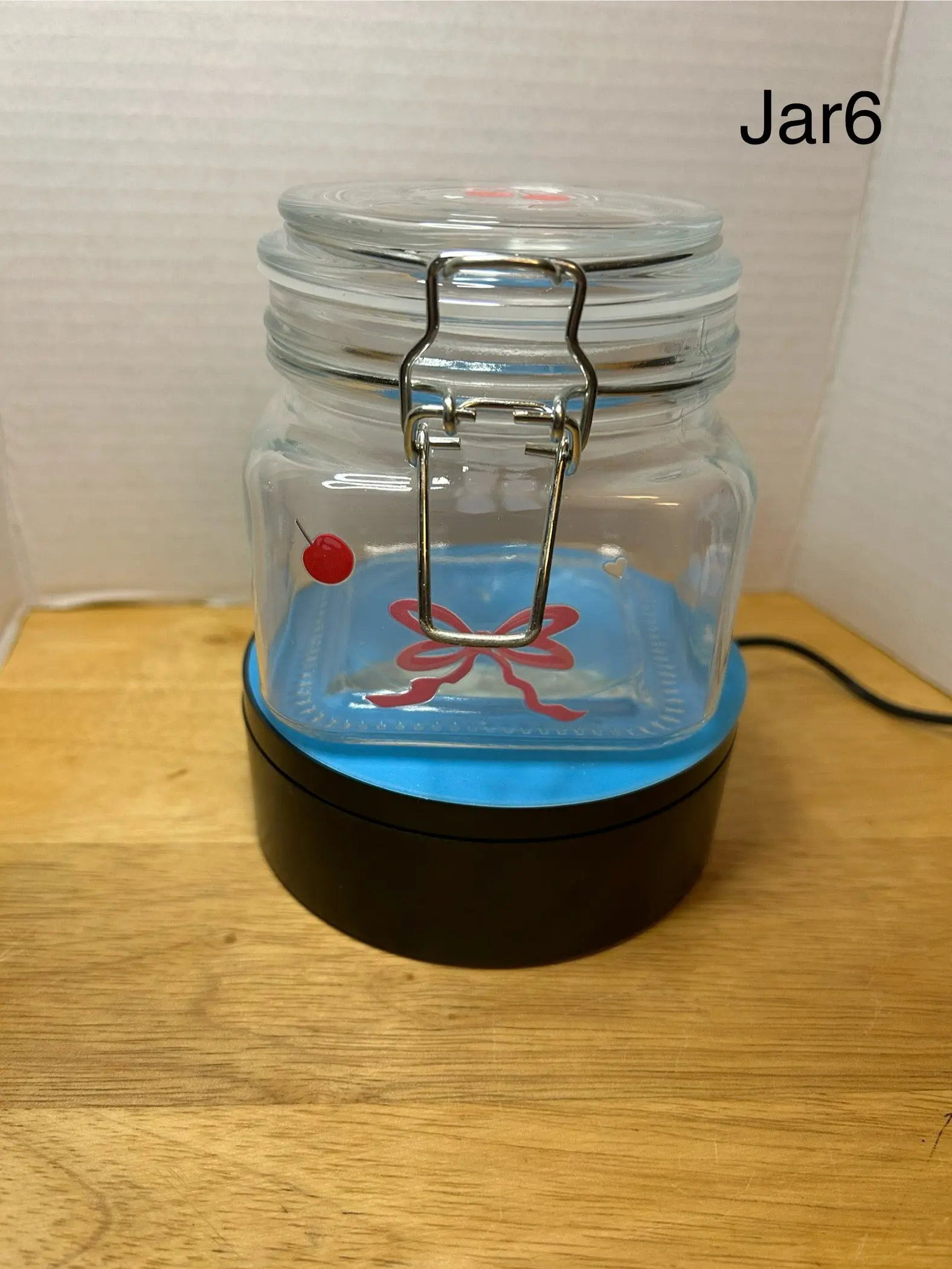 Glass Square Jar with  clip Lid featuring a Beautiful Design
