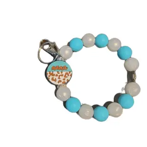 Handmade Beaded Wristlet Keychain with Focal and Spacers, Featuring Colorful Beads and Decorative Elements