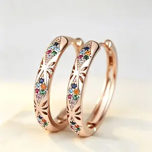 Shiny copper earrings, inlaid with zircon stones, featuring a hollow circular design, luxurious and stylish.Perfect for women's daily wear, parties and dates, and also an ideal gift choice