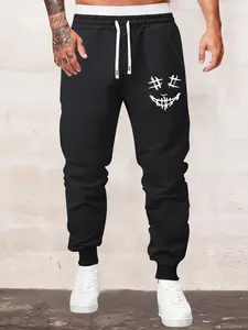 Spring and Autumn new men's trousers smiley pattern print casual sports regular large size elastic waist drawstring trousers fitness running travel holiday men's Cuffed pants