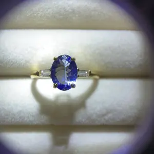 <PingEast jewelry > 925 sterling silver ring in gold tone featuring a 5×7mm natural Tanzanite, with certificate