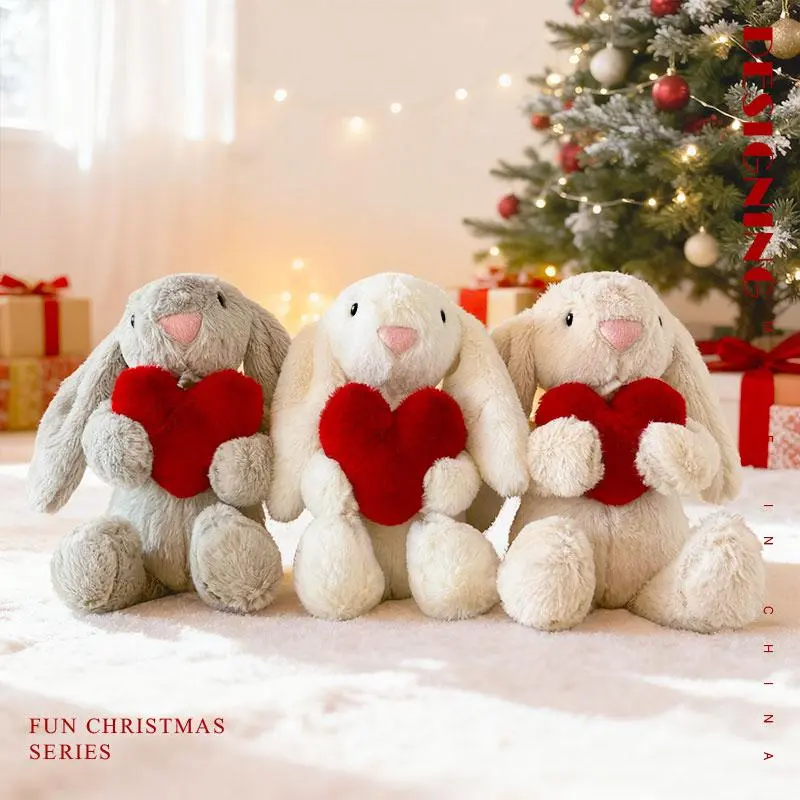 An adorable plush bunny with long ears—holding a heart to express affection and accompanied by a gift bag—makes the perfect gift for Valentine's Day, anniversaries, and birthdays.