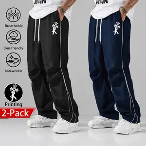2-pack unisex casual long pants with a unique cross print, American retro street-style athletic long pants, soft and breathable straight-leg casual pants with side stripe detailing, perfect for sports and everyday streetwear wear.
