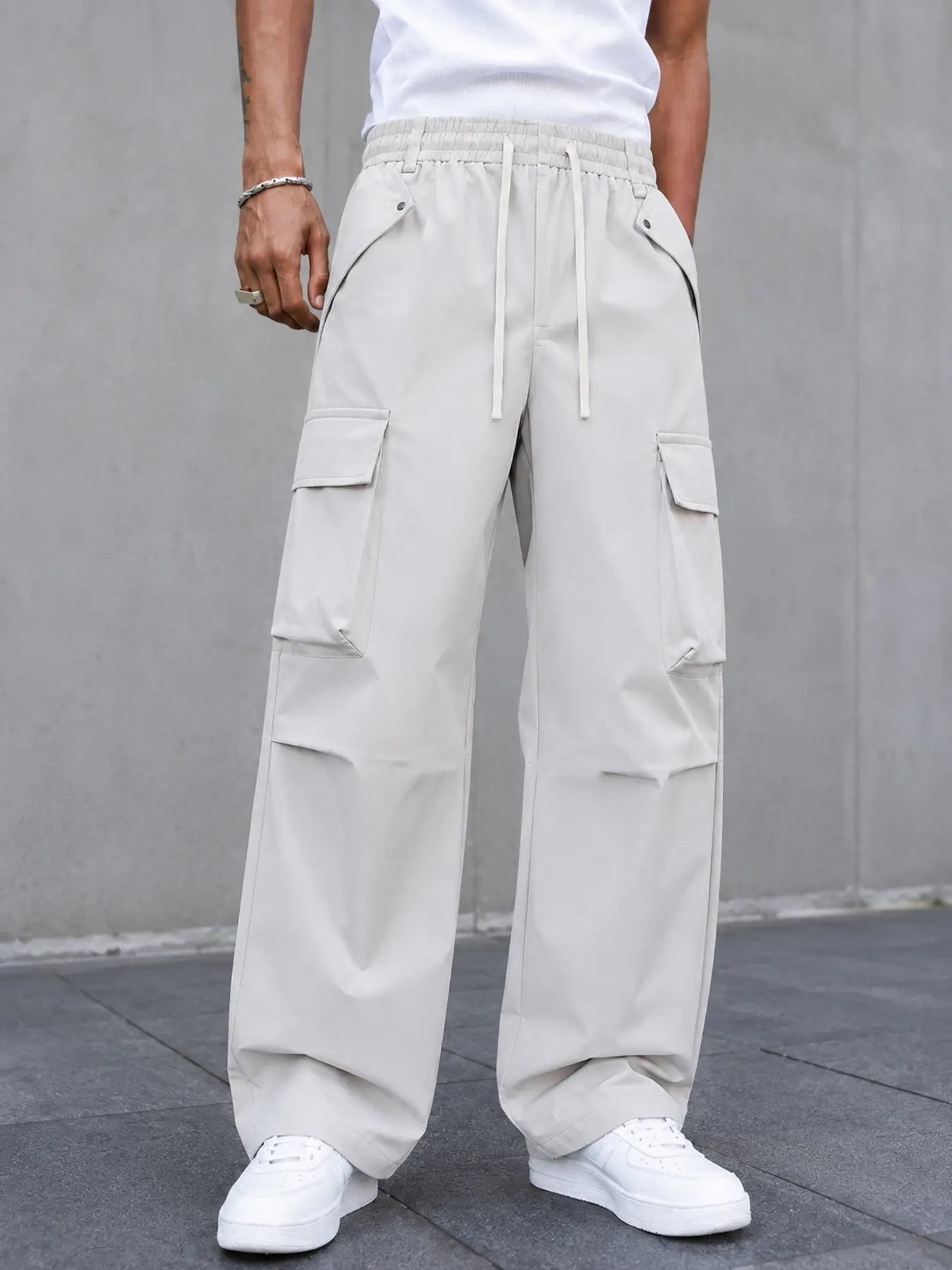 Men’s Wide-Leg Cargo Pants Built for Back-to-School Streetwear, with an Adjustable Drawstring Waist and Roomy Flap Pockets